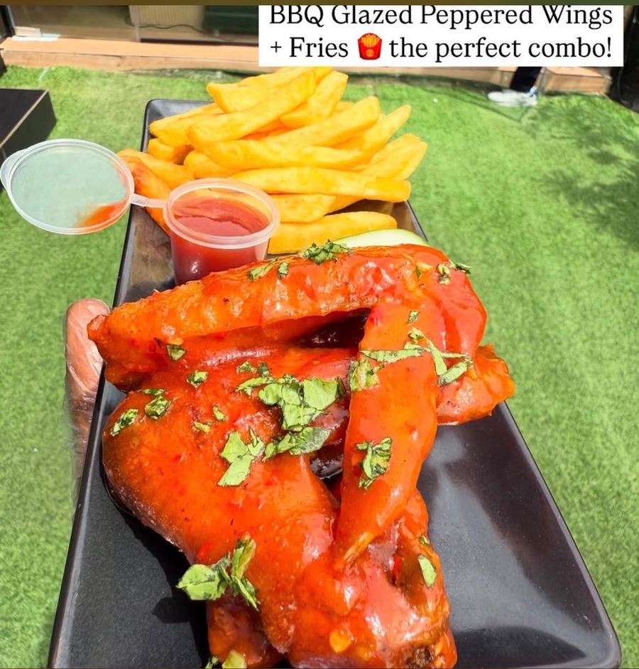 Crispy potatoes and chicken wings
