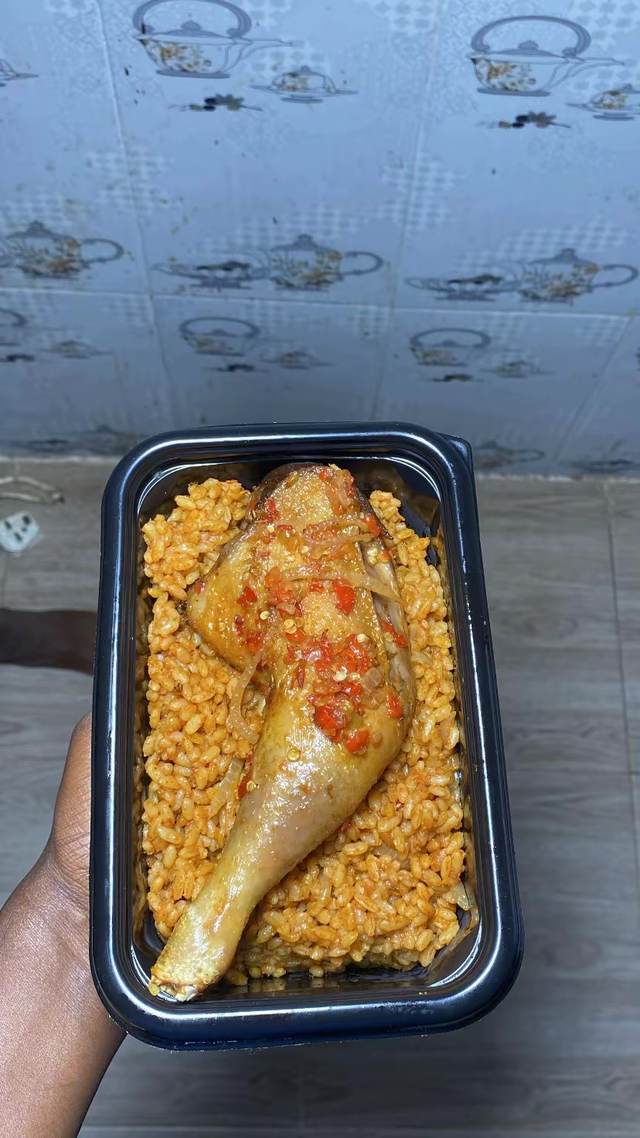 Jollofrice and peppered chicken