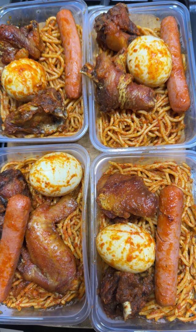 Jollof spaghetti, chicken, egg&Sausage